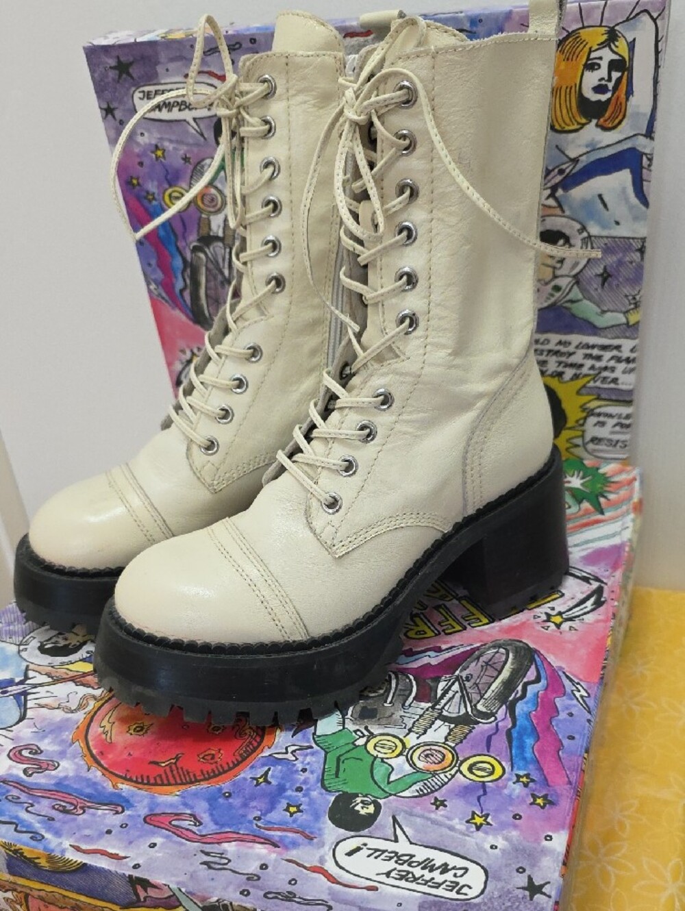 Jeffrey Campbell Locust combat boots in ivory leather, featuring a chunky lug